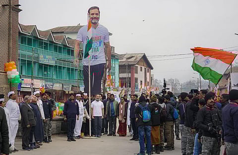 Congress leader Rahul Gandhi unfurls the national flag at the historical Lal Chowk during the 'Bharat Jodo Yatra', in Srinagar, Jan. 29, 2023. (Photo | PTI)