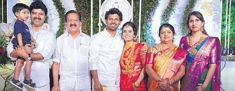 Newlyweds Ramith Chennithala and Junita Mariam with Ramesh Chennithala and other family members