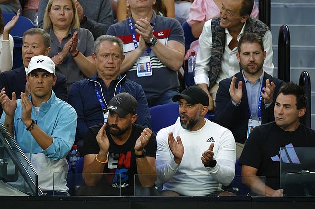 Supporters of Elena Rybakina of Kazakhstan watch from her team's box as she plays against Aryna Sabalenka of Belarus during the women's singles final. (Photo | AP)