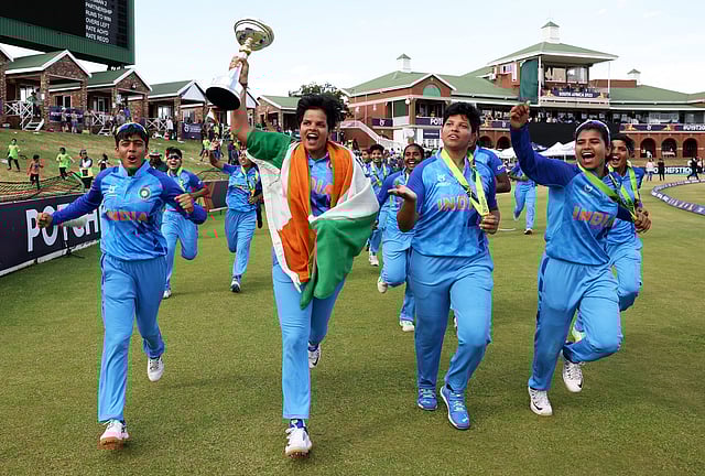 India skipper Shafali Verma and her teammates celebrate their win over England in   Potchefstroom, South Africa. (Photo | PTI)