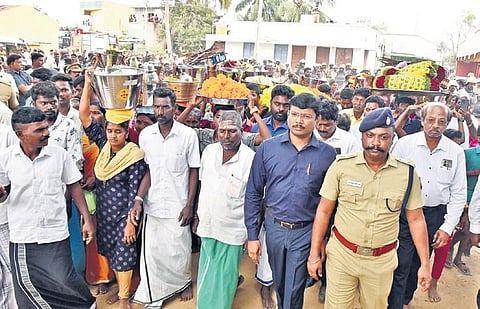 Men, women and children took out a procession to the temple in the presence of collector B Murugesh, DIG M S Muthusamyand other officials at Thenmudiyanur village in Thandrampattu in Tiruvannamalai di