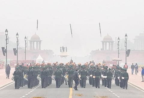 Assam Rifles congingent rehearses for the Republic Parade 2023 at the Kartavya Path during a cold and foggy morning in New Delhi on Tuesday. (Photo| PTI)