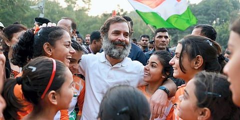 Congress leader Rahul Gandhi with young supporters during the party's Bharat Jodo Yatra, in Alwar district, Tuesday, Dec. 20, 2022.(File photo | AP)