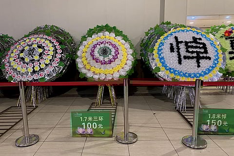 Funeral flowers are kept at a crematorium in China's southwestern city of Chongqing on December 22, 2022. (Photo | AFP)