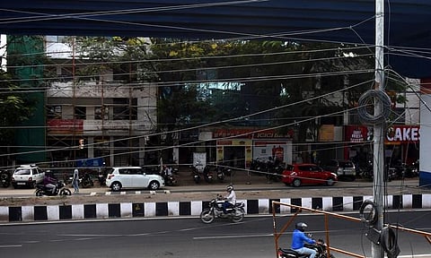 Motorists raise eyebrows over low hanging cables in Coimbatore