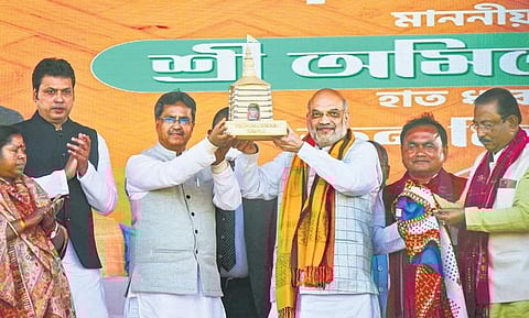 Union Home Minister Amit Shah with Tripura Chief Minister Manik Saha and BJP MP Biplab Deb during a rally at Sabroom in South Tripura district on Thursday | pti