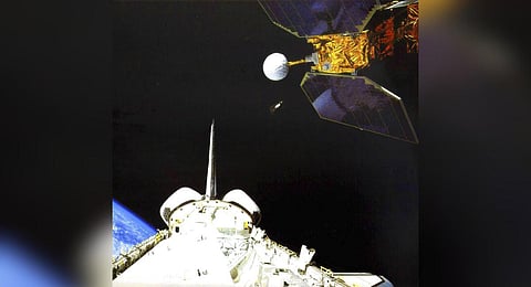 The space shuttle Challenger launches the Earth Radiation Budget Satellite in 1984. (Photo | AP)