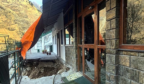 A collapsed part of a house due to landslides at Joshimath in Chamoli district of Uttarakhand, Saturday, Jan. 7, 2023. (Photo | PTI)