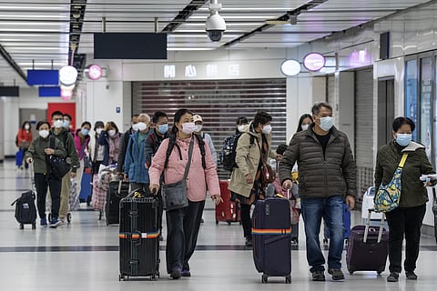 Chinese travellers rush to take advantage of reopening