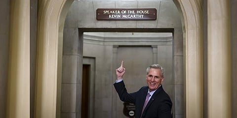 House Speaker Kevin McCarthy gestures towards the newly installed nameplate at his office after he was sworn in as speaker of the 118th Congress in Washington, Jan. 7, 2023. (Photo | AP)