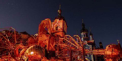 A cupola lies on the ground in front of the Orthodox Church which was destroyed by Russian forces.(Photo | AP)