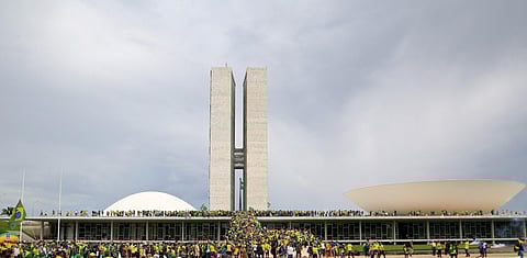 Supporters of Brazilian former President Jair Bolsonaro invade the National Congress in Brasilia on January 8, 2023.  (Photo | AFP)