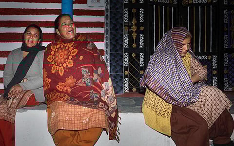 Family members mourn the death of Deepak Sharma, who along with three other civilians was gunned down by unidentified men, in Dhangri area of Rajouri, on Jan 1, 2023. (Photo | PTI)