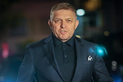 Former Prime Minister Robert Fico arrives to his party's headquarters after polling stations closed for an early parliamentary election, in Bratislava, Slovakia. (Photo | AP)