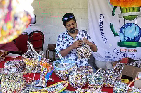 Satyajit making art out of plastic wrappers at The Arboretum in Puducherry. (Photo | Sriram R)