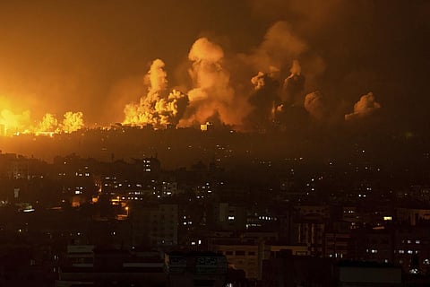 Fire and smoke rise following an Israeli airstrike, in Gaza City, Sunday, Oct. 8, 2023. (Photo | AP)