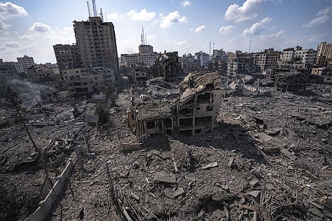 A view of the rubble of buildings hit by an Israeli airstrike, in Gaza City, Tuesday, Oct. 10, 2023. (Photo | AP)