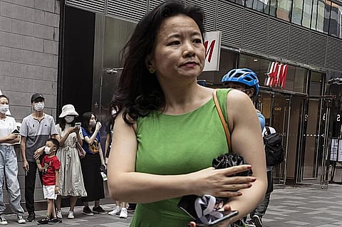 FILE - Cheng Lei, a Chinese-born Australian journalist for CGTN, the English-language channel of China Central Television, attends a public event in Beijing on Aug. 12, 2020.