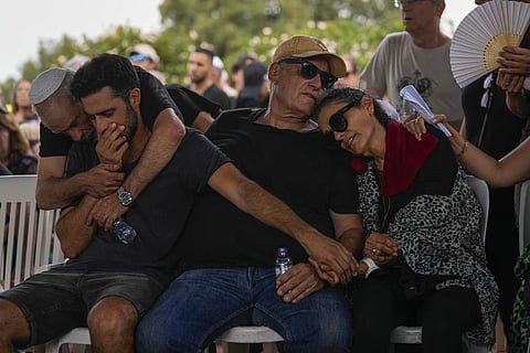 Mourners attend the funeral of one May Naim, 24, durinig her funeral in Gan Haim, Oct 11, 2023. (Photo | AP)