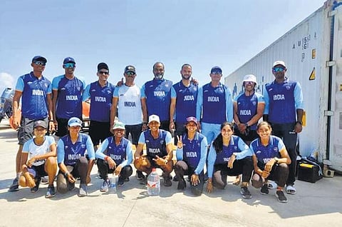 Coach Madhu with his team.