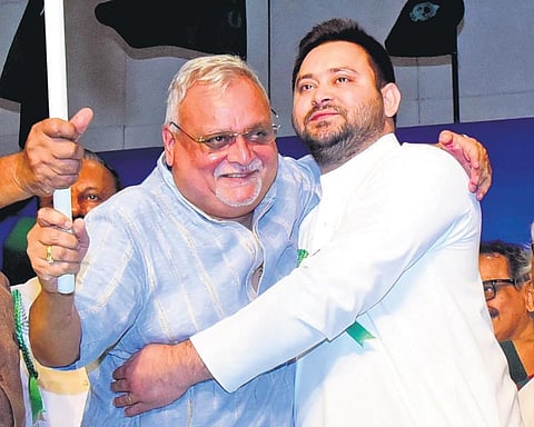 M V Sreyamskumar with Bihar Deputy Chief Minister Tejashwi Yadav in Kozhikode on Thursday | Express