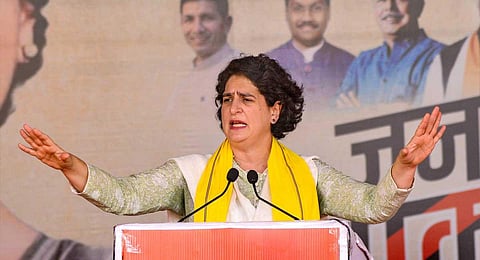 Congress general secretary Priyanka Gandhi addresses a gathering during the party's Jan Aakrosh Yatra, in Mandla district, Madhya Pradesh, Oct. 12, 2023. (PTI )