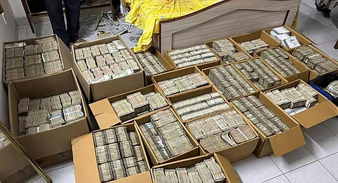 The cash seized at the residence of vice-president of the Karnataka Contractors’ Association R Ambikapathy, in Bengaluru on Friday | EXPRESS