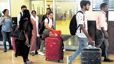 Achyut M C, Gopika Shibu, Sisira M K, Radhikesh Ravindran Nair and his wife Rasita T P at Kochi Airport after arriving from Israel on Friday. (Photo | Express)