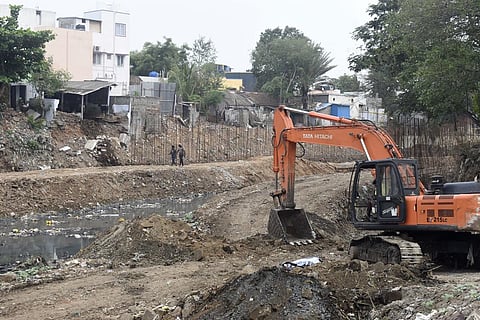 Works going on for the rejuvenation of the Sanganur canal. (Photo | Express)