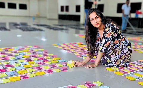 Shivali Johra Srivastava attempting to break a origami world record at GITAM in Hyderabad on Saturday