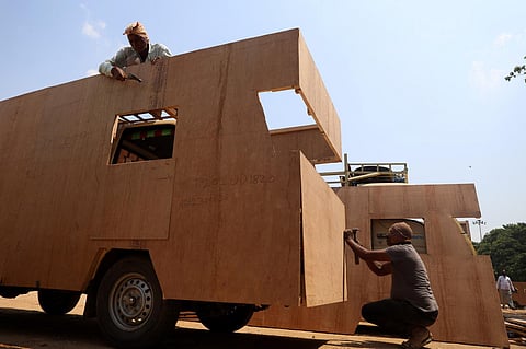 With less than 50 days left for the Assembly elections, artisans prepare the ‘pracharam’ vans to be used by various political parties for campaigning, at the NTR Stadium. | Sri Loganathan Velmurugan