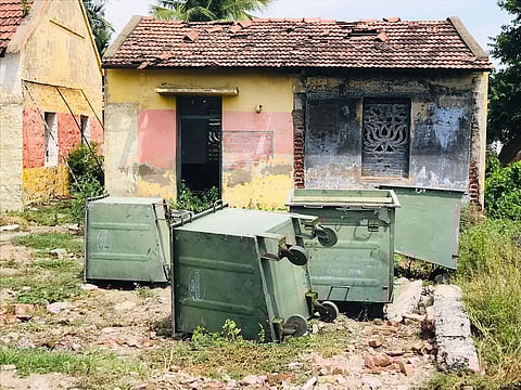 Large metal garbage containers are damaged and rusting in Perali in Perambalur district. (Photo | Express)