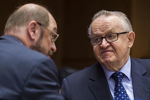 FILE - Former Finnish President Martti Ahtisaari, right, talks with European parliament President Martin Schultz during a high level conference April 25, 2012. (Photo | AP)