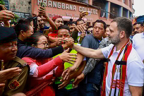 Congress leader Rahul Gandhi greets supporters during a 'Padyatra' from Chanmari to Raj Bhawan, in Aizawl, Mizoram, Monday, Oct. 16, 2023. (Photo | PTI)
