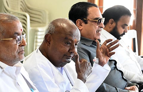 JDS supremo HD Deve Gowda with party state president C M Ibrahim, MLA GT Devegowda and others, at the party's office in Bengaluru. (File Photo | Express)