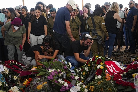 Mourners attend the funeral of the Kotz family in Gan Yavne, Israel, Tuesday, Oct 17, 2023. (Photo | AP)