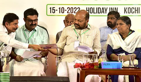 Industries Minister P Rajeeve, Mayor M Anilkumar and K A Rajesh, CIPET Kochi director, at the launch event of biodegradable paper products. (Photo |A Sanesh)