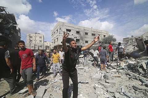 Palestinians look for survivors of the Israeli bombardment of Rafah, southern Gaza Strip, Tuesday, Oct. 17, 2023. (Photo | AP)