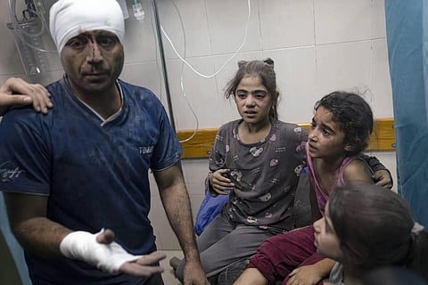 Those injured in the blast being treated in a hospital in Khan Younis. (AP/ Fatima Shabbir)