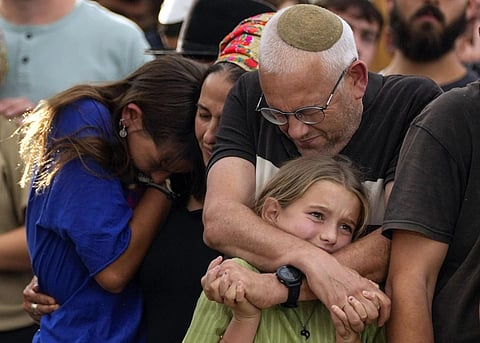 Family members mourn during the funeral of Israeli soldier Shilo Rauchberger at the Mount Herzl cemetery in Jerusalem , Oct 12, 2023. (Photo | AP)