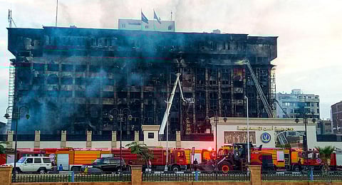 Firefighters try to extinguish a fire at a police headquarters in Ismailia on October 2, 2023. (Photo | AFP)