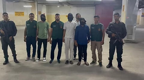 Delhi police with the suspected ISIS terrorists.