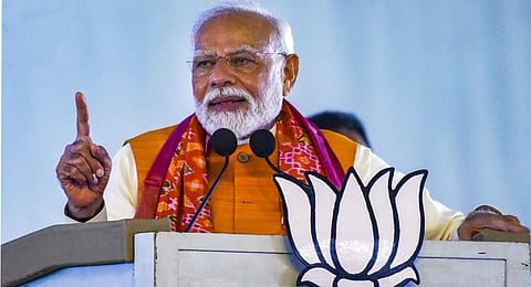 Prime Minister Narendra Modi speaks during a public meeting in Mahabubnagar district. (Photo | PTI)