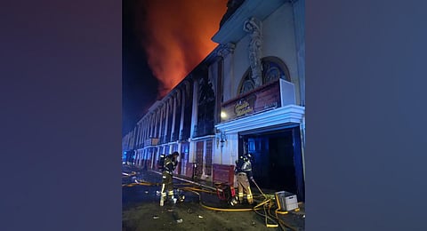 firefighters work outside a nightclub on fire in Murcia, south-eastern Spain in the early hours of Sunday. (Photo | AP)