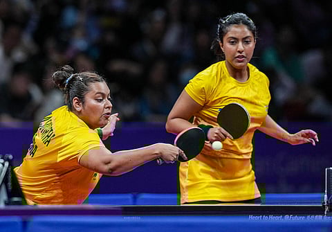 India's Sutirtha Mukherjee (L) and Ayhika Mukherjee in action against Korean pair of Suyong Cha and Sugyong Pak. (Photo | PTI)
