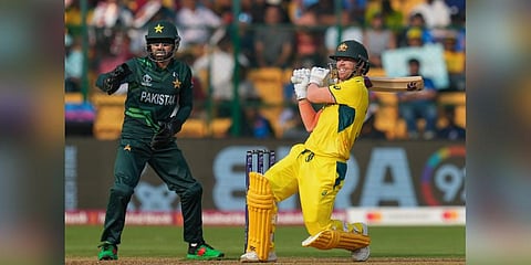 Australia's David Warner plays a shot during the ICC Men's Cricket World Cup 2023 match between Pakistan and Australia at M. Chinnaswamy Stadium, in Bengaluru (Photo | PTI)