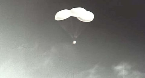 Crew module of ISRO's TV-D1 test flight of Mission Gaganyaan descends using parachutes after successfully separating from the launch vehicle | PTI