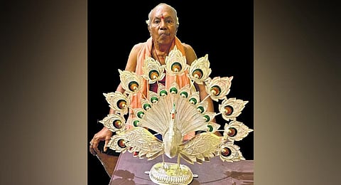 The 70-year-old filigree artist has designed the 22 ft tall and 13 ft wide Kafla Bazaar Chandi Medha.