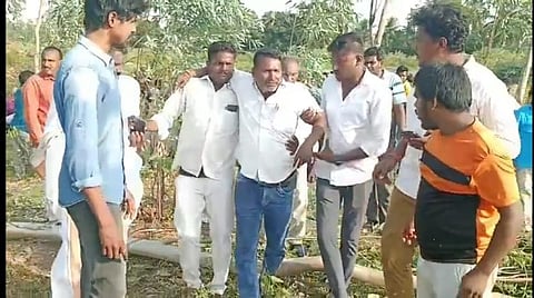 An injured Bhadrachalam temple employee being taken away at Purushottapatnam on Sunday