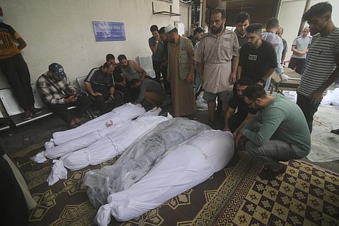 Palestinians mourn their relatives killed in the Israeli bombardment of the Gaza Strip in Rafah, Monday. (Photo | AP)